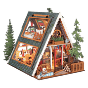 Model of a wooden cabin with detailed interior and exterior with trees.
