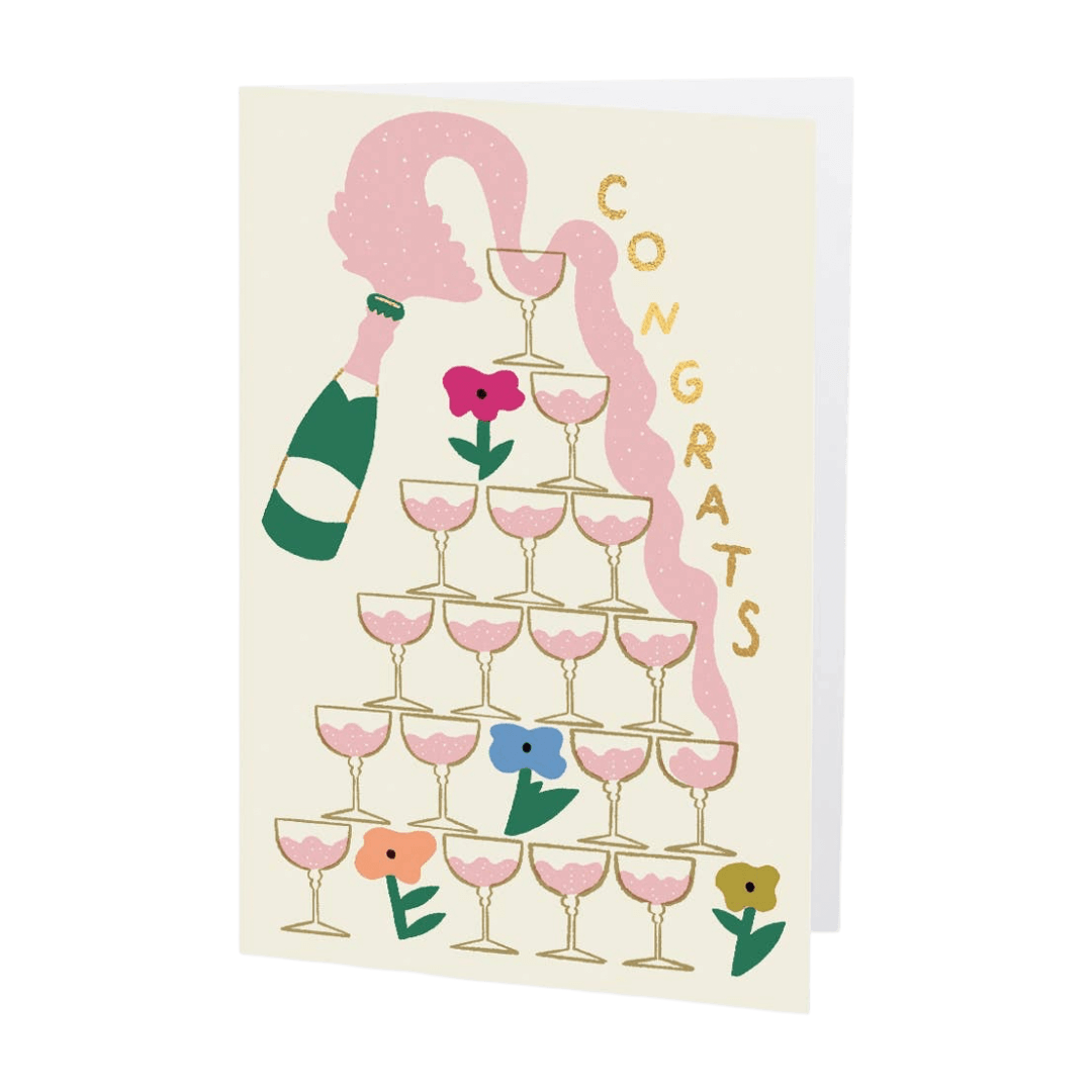 Greeting card with champagne bottle, glasses, and flowers on a beige background