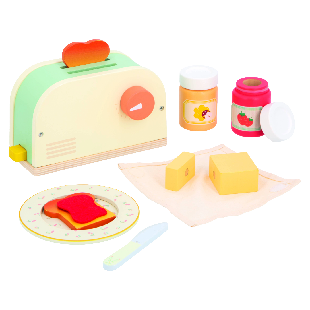 Toy toaster set with bread, butter, and jam.
