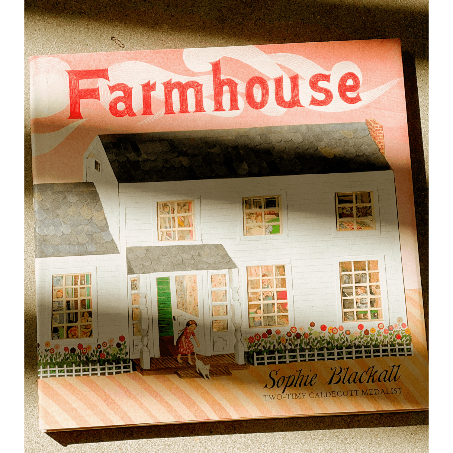 Book cover of 'Farmhouse' by Sophie Blackall with a farmhouse illustration.