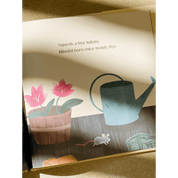 Illustration of a watering can, flowers, and a mouse in a children's book.
