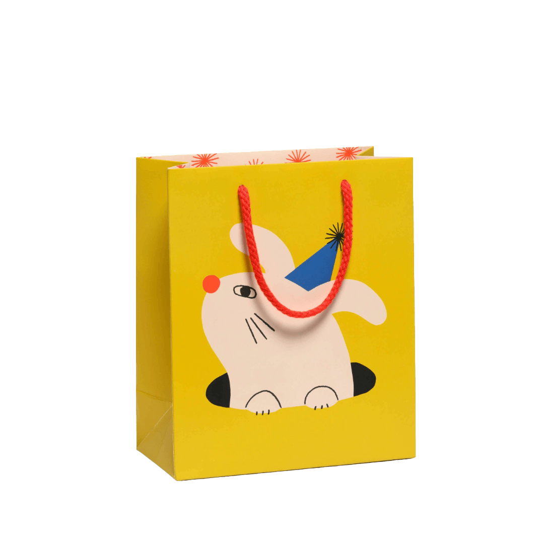 Yellow gift bag with a cartoon rabbit design