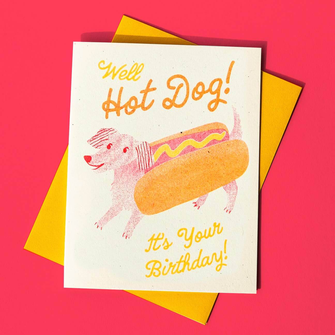 Birthday card with hot dog illustration and text on a pink background