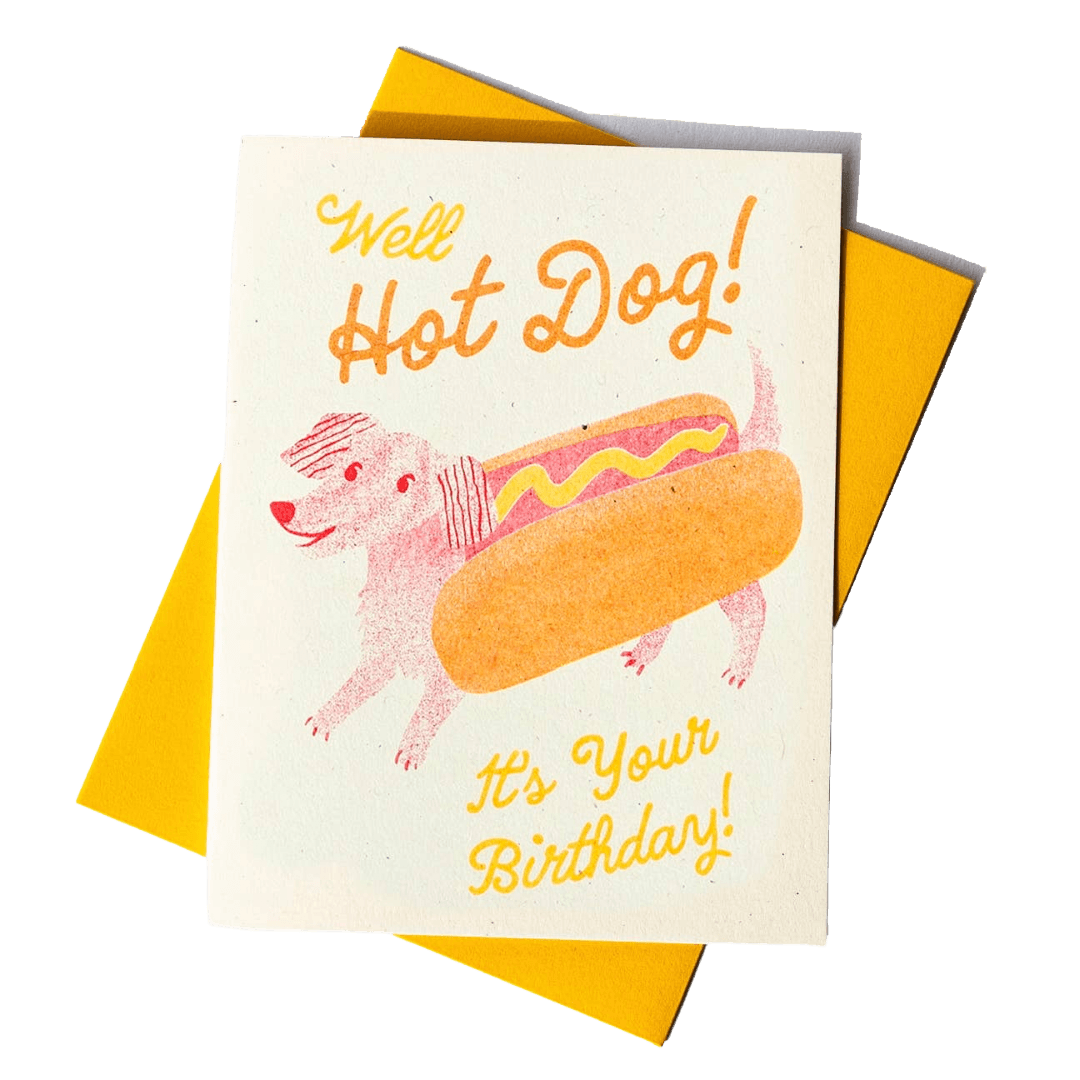 Birthday card with a hot dog illustration and text on a yellow envelope