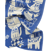 Blue towel with white cat and kitchen item pattern