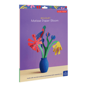 Packaged Matisse Paper Bloom craft set with colorful flowers and a blue vase on a purple background.