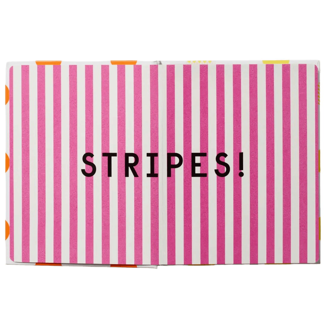 Open book with pink and white striped pages with 'STRIPES!' text.