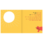 Open book with a yellow background, white sun illustration, and red cat on a yellow background.
