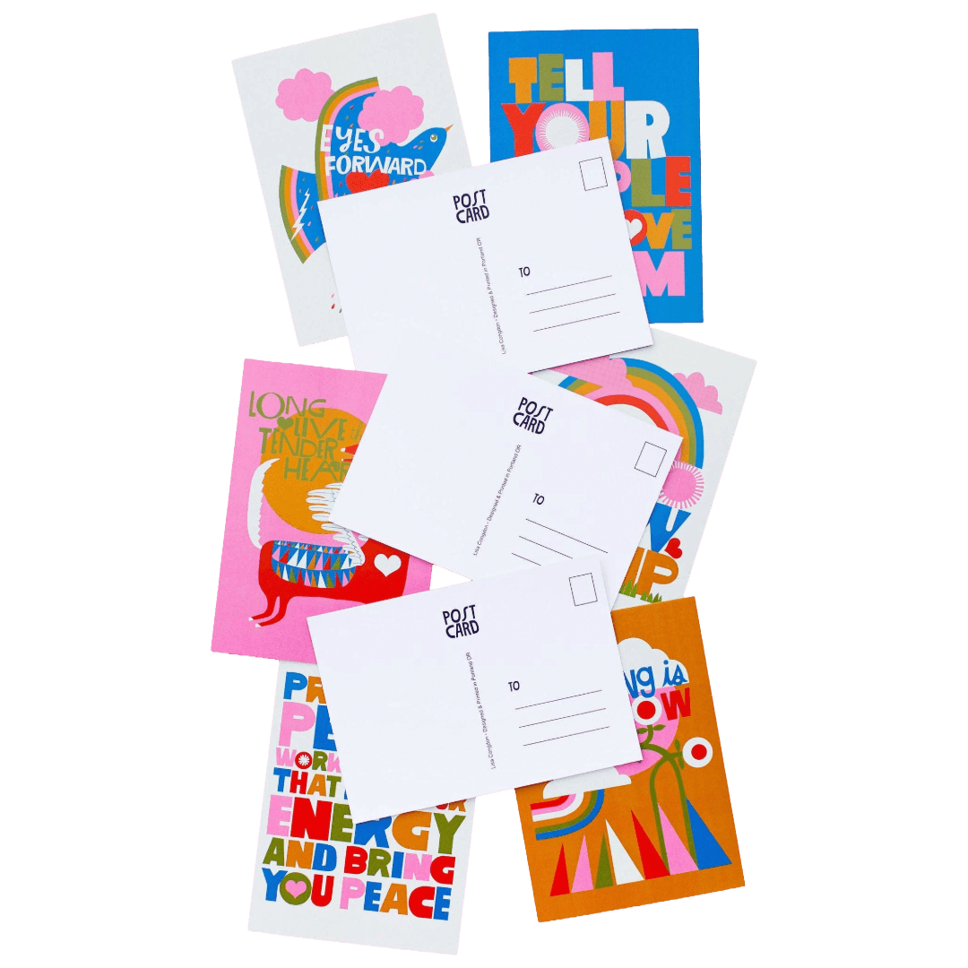 Collection of colorful postcards with various designs.