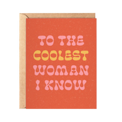 Greeting card with 'To the Coolest Woman I Know' text on a red background