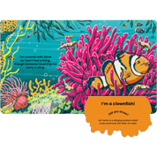 Children's open book with pages of a colorful underwater scene featuring a clownfish.
