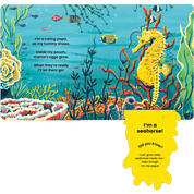 Children's book open with pages of a seahorse illustration and underwater scene.