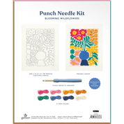 Punch needle kit packaging with floral design and tools on a white background