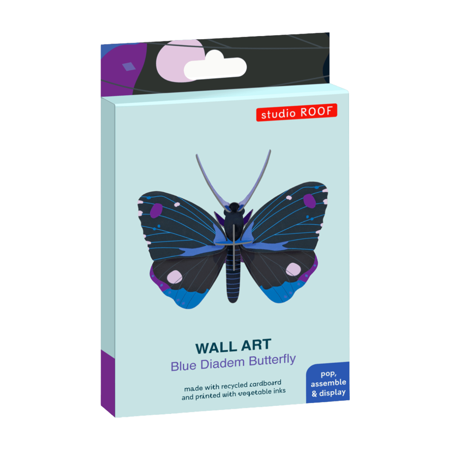 Packaged wall art of a blue diadem butterfly with 'studio ROOF' branding on a light blue background.