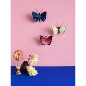 Butterflies and flowers on a pink and blue background