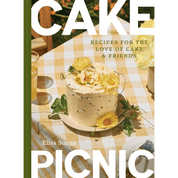 Book cover of 'Picnic Cake' with a cake and outdoor picnic table setting on the cover
