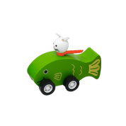 Toy green fish with a white cat on top