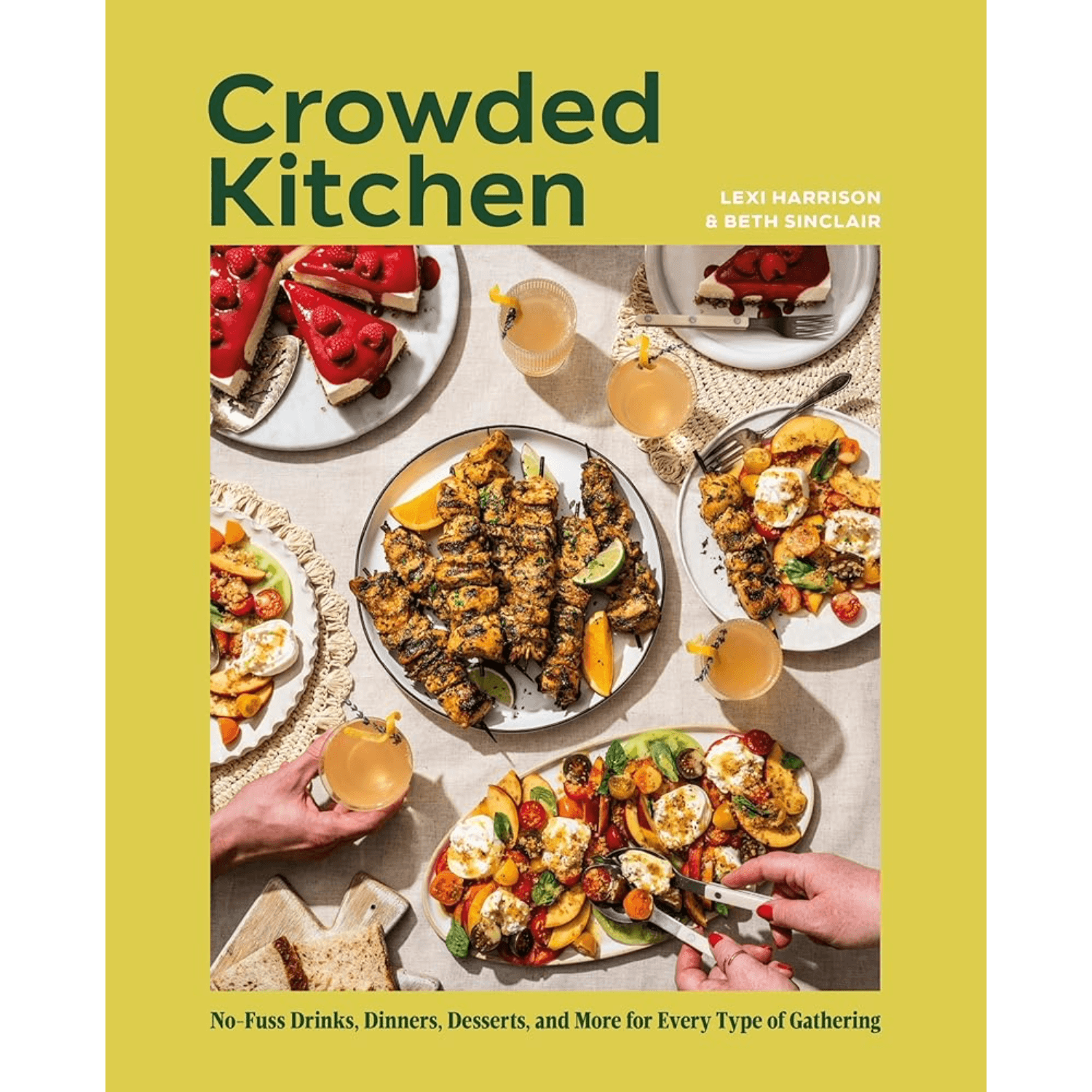 Book cover for 'Crowded Kitchen' by Lexi Harrison and Beth Sinclair, featuring a yellow background with a central food gathering photograph and the title in large dark green text.