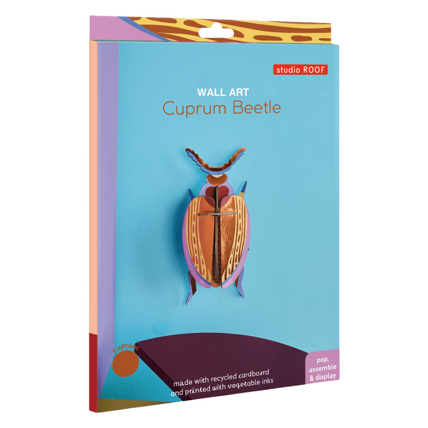 Packaging of Cuprum Beetle wall art by studio ROOF.