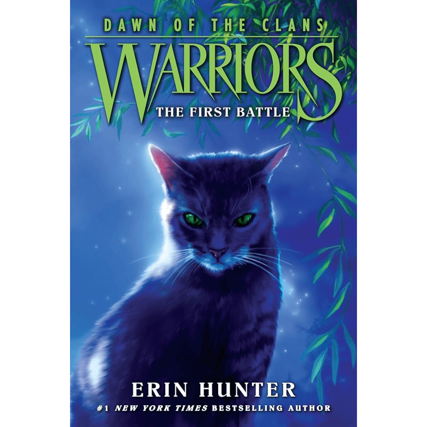 Book cover of 'Warriors: The First Battle' by Erin Hunter featuring a cat with green eyes with an intense expression in blue moonlight and a tree above.