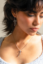Bad to the Bow Earrings - Silver Rhodium Plated