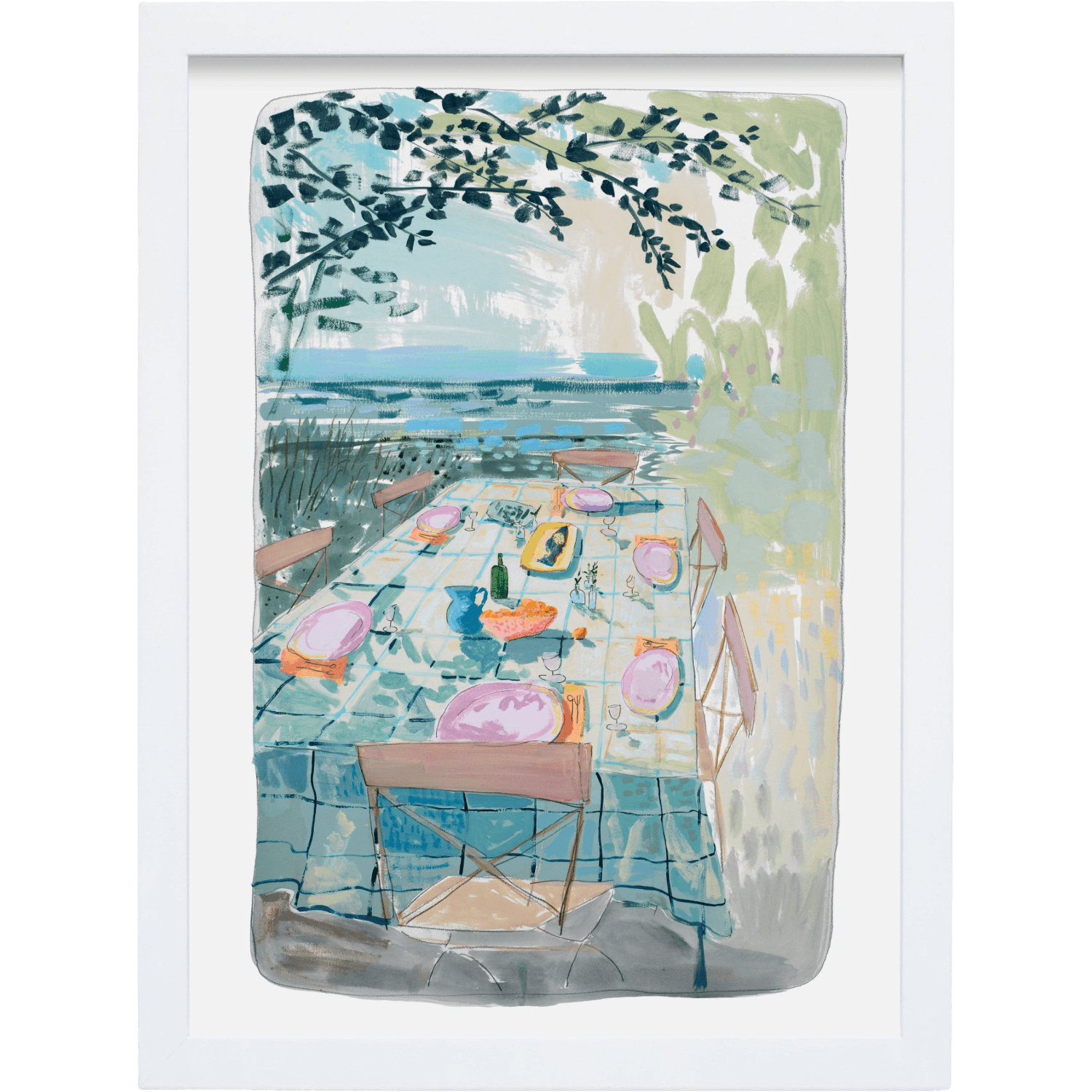 Framed artwork of a scenic outdoor setting with tables and chairs by a body of water.
