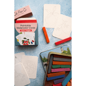 Paintable fruit and vegetable watercolor cards with coloring tools on a blue textured surface