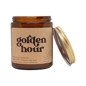 Candle jar labeled 'golden hour' with a gold lid