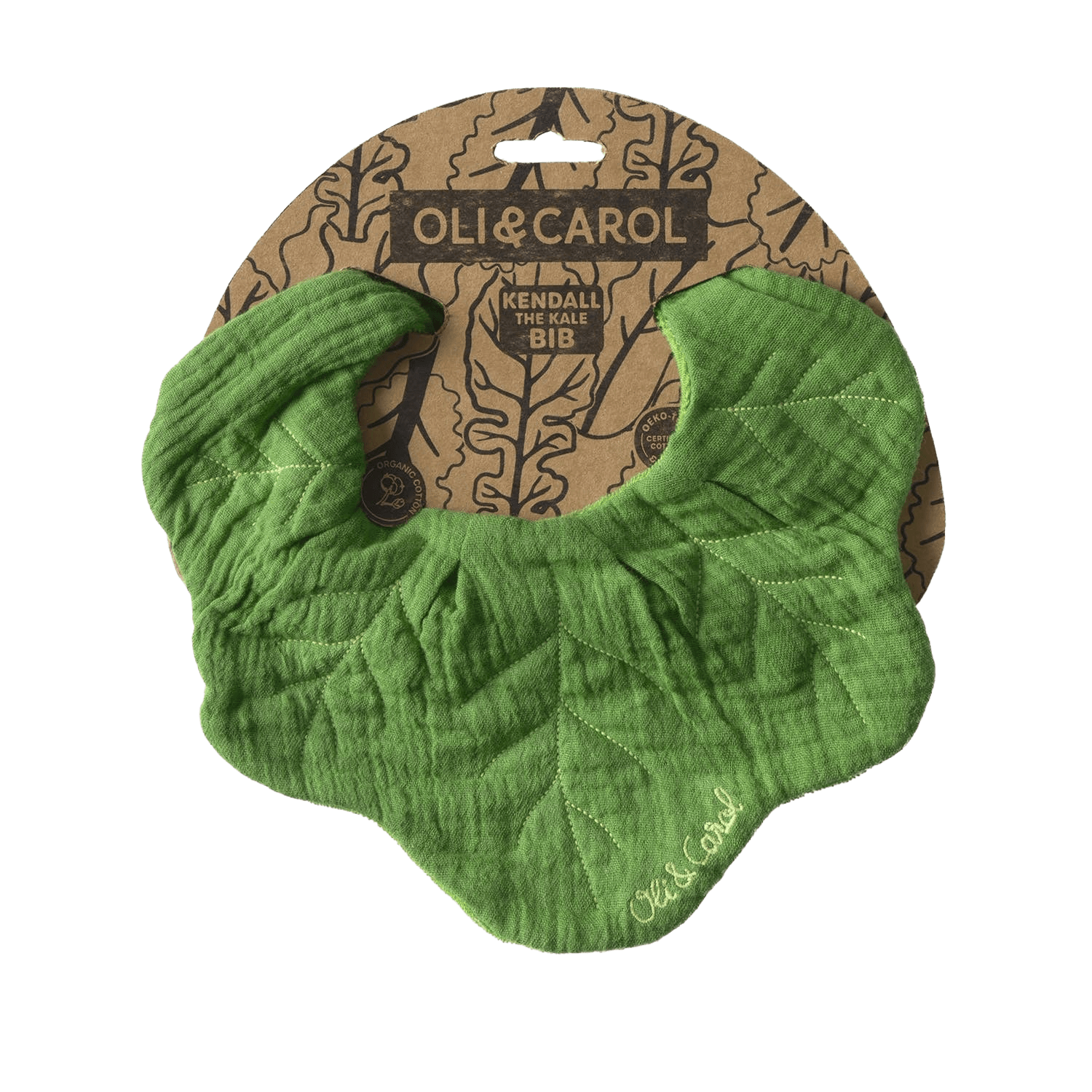 Green bib with leaf pattern on a brown package labeled 'Oli & Carol'.