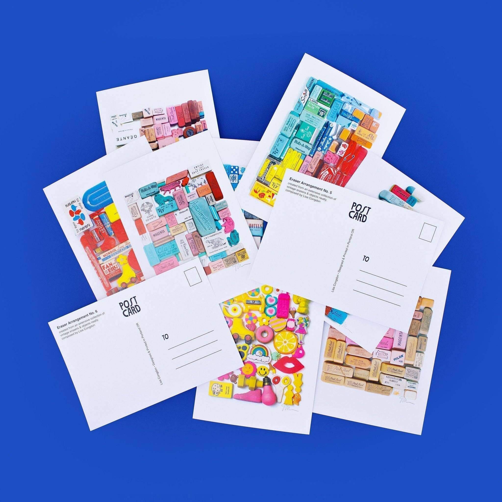 Set of colorful postcards on a blue background