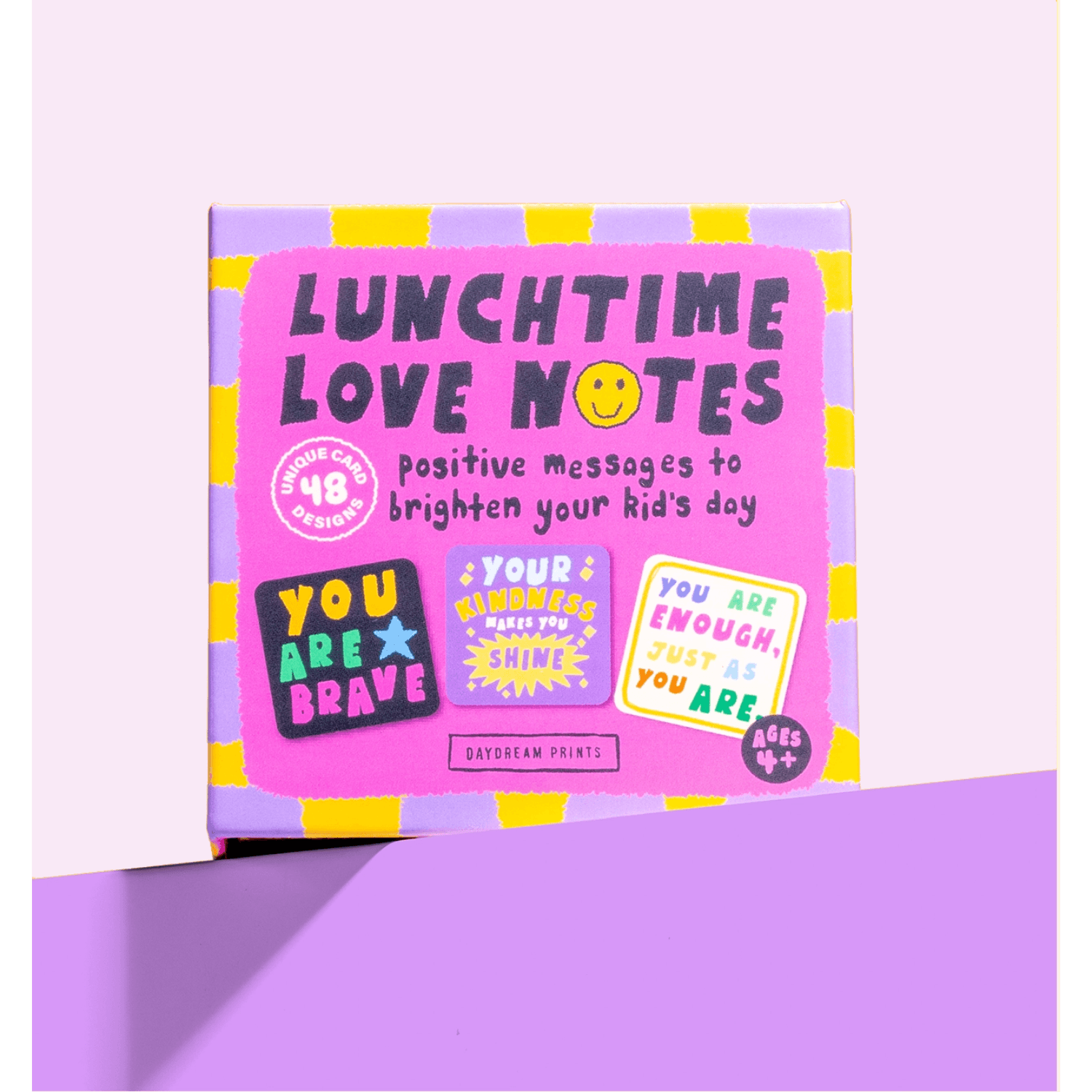 Pack of 'Lunchtime Love Notes' with positive messages on a purple background