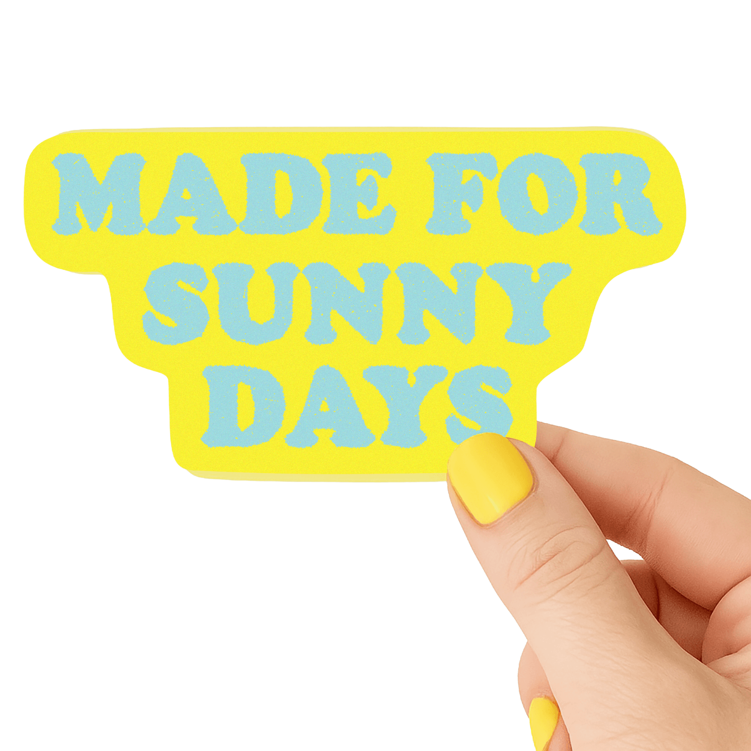 Hand holding a yellow sign with 'MADE FOR SUNNY DAYS' text