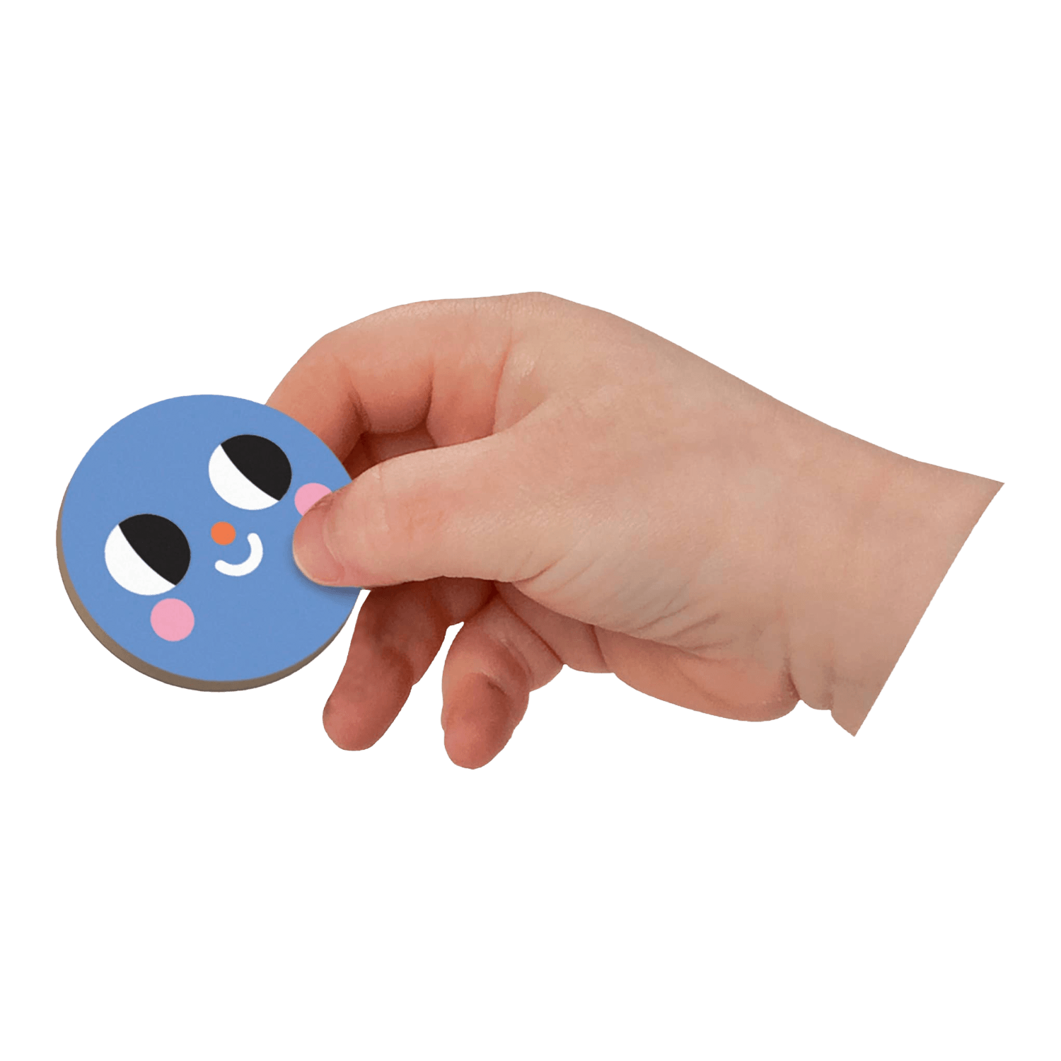 Hand holding a blue circular magnet with a face design