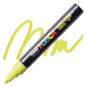 Uni Posca marker with yellow green squiggle on a black background