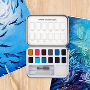 The inside of a Grabie Ocean colors watercolor palette