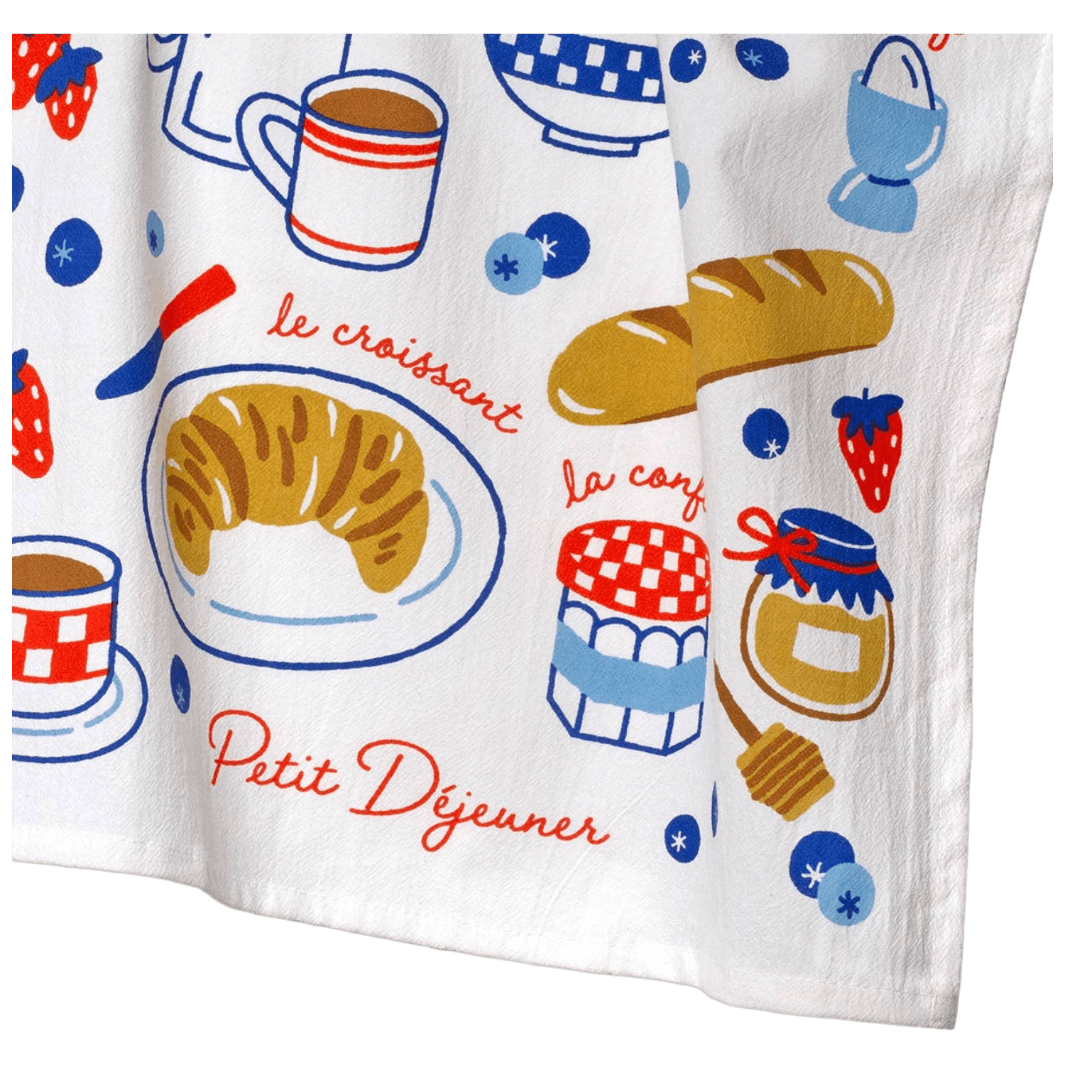 White towel with colorful illustrations of french breakfast items including a croissant, coffee, and jam.