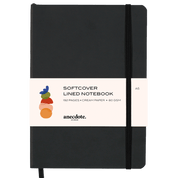 Black softcover lined notebook with a white label.