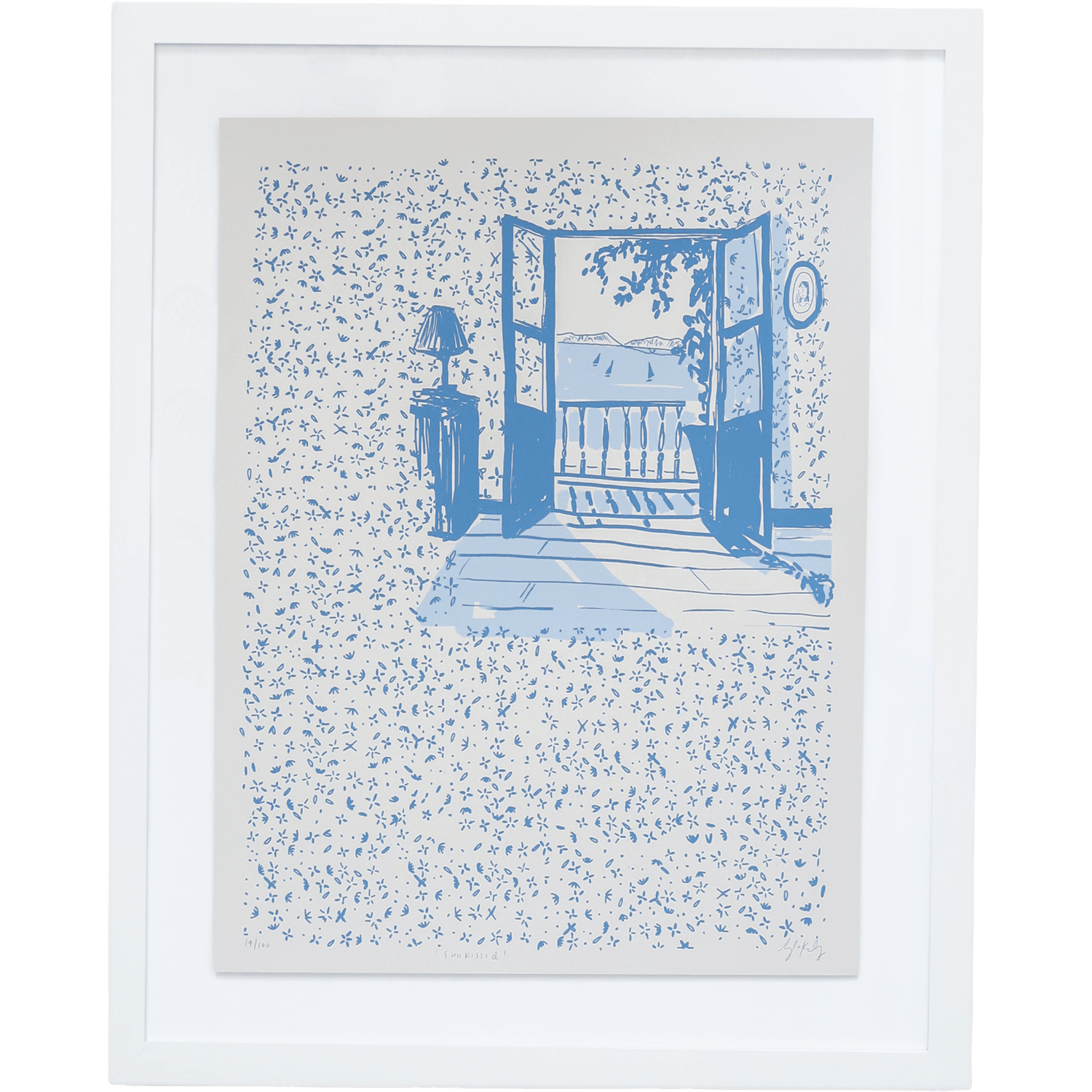 Framed artwork with a blue and cream illustration of a open door and lantern on a speckled background. The french doors are open to a balcony with a view of a lake and boats.