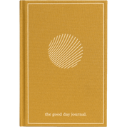 Yellow journal with a white circular design and 'the good day journal' text