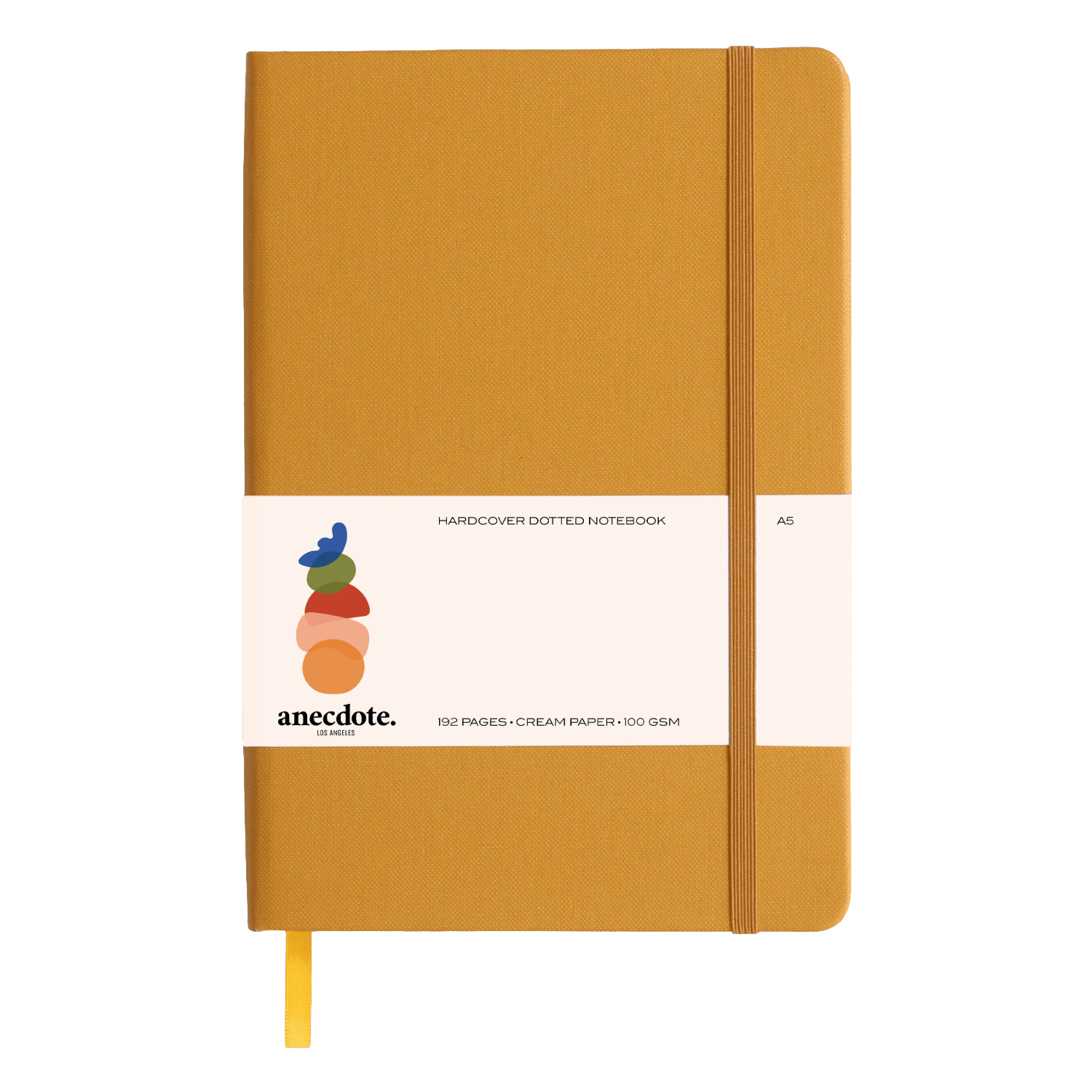 Mustard yellow notebook with a white label