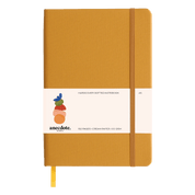 Mustard yellow notebook with a white label