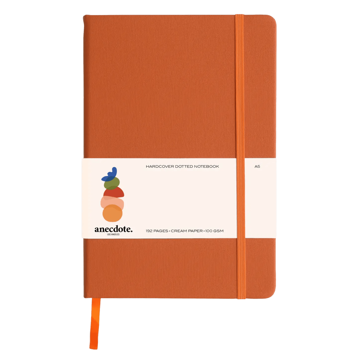 Orange notebook with a white label