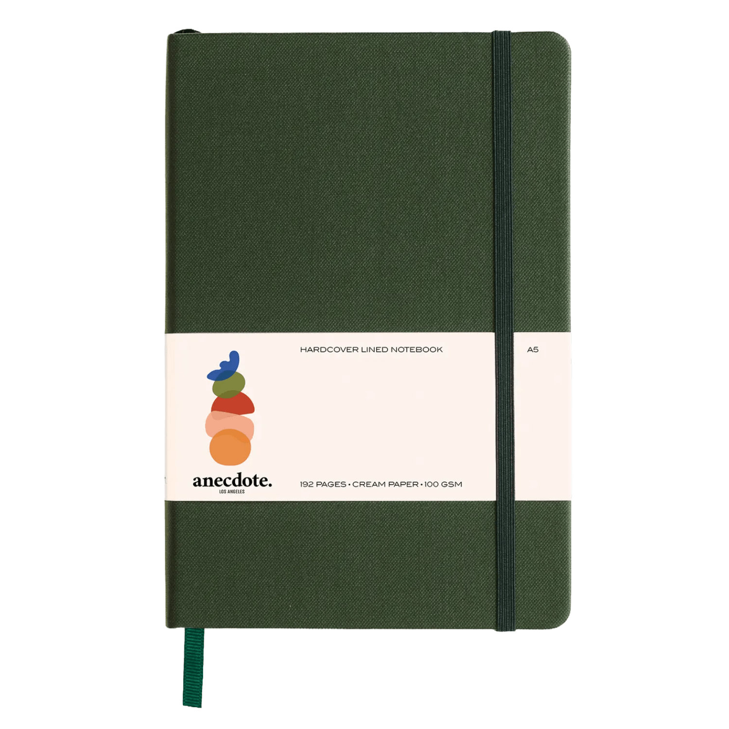 Green notebook with a visible white brand label