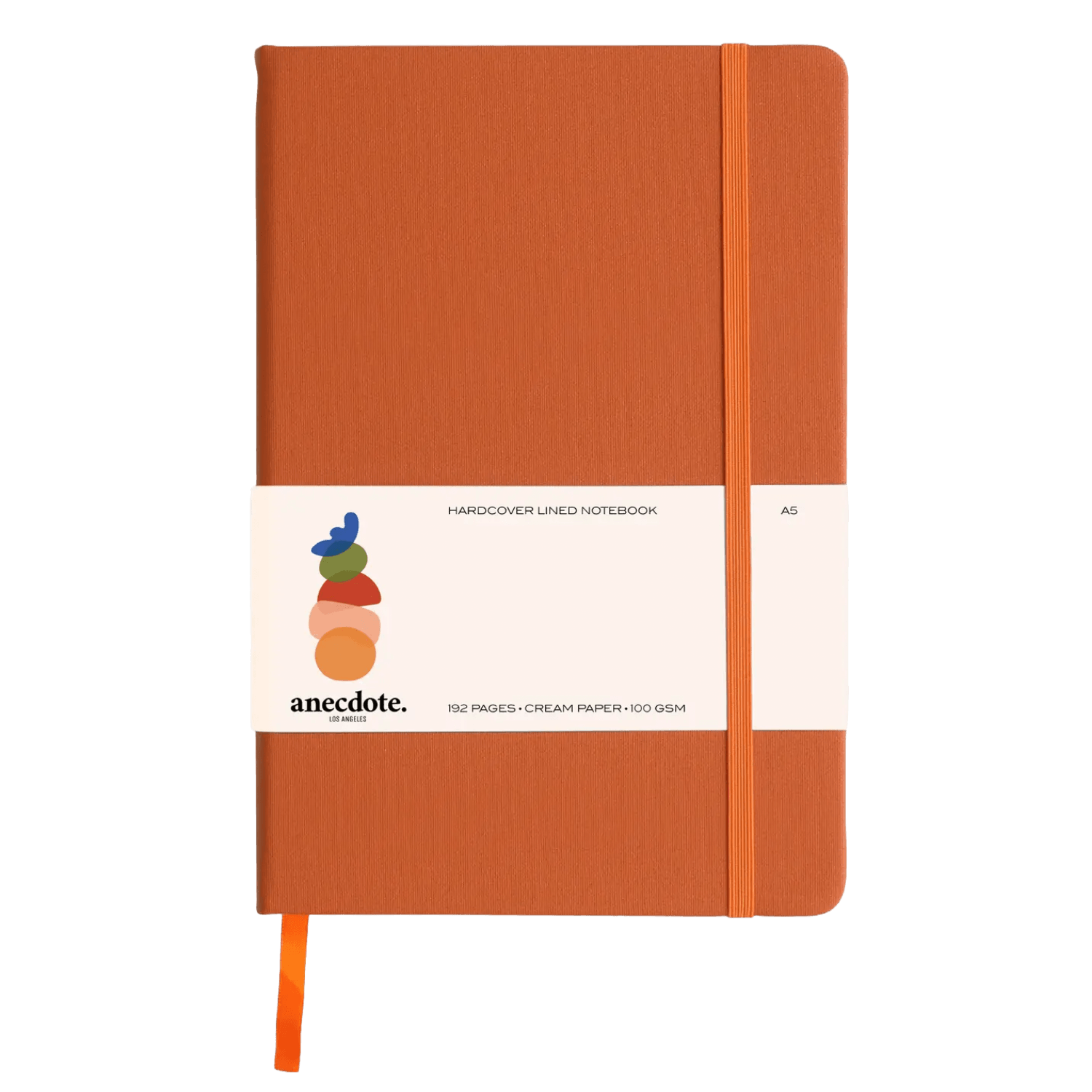 Orange notebook with a white label 
