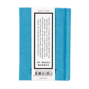 Blue notebook with a white label.