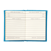 Open notebook with lined pages.