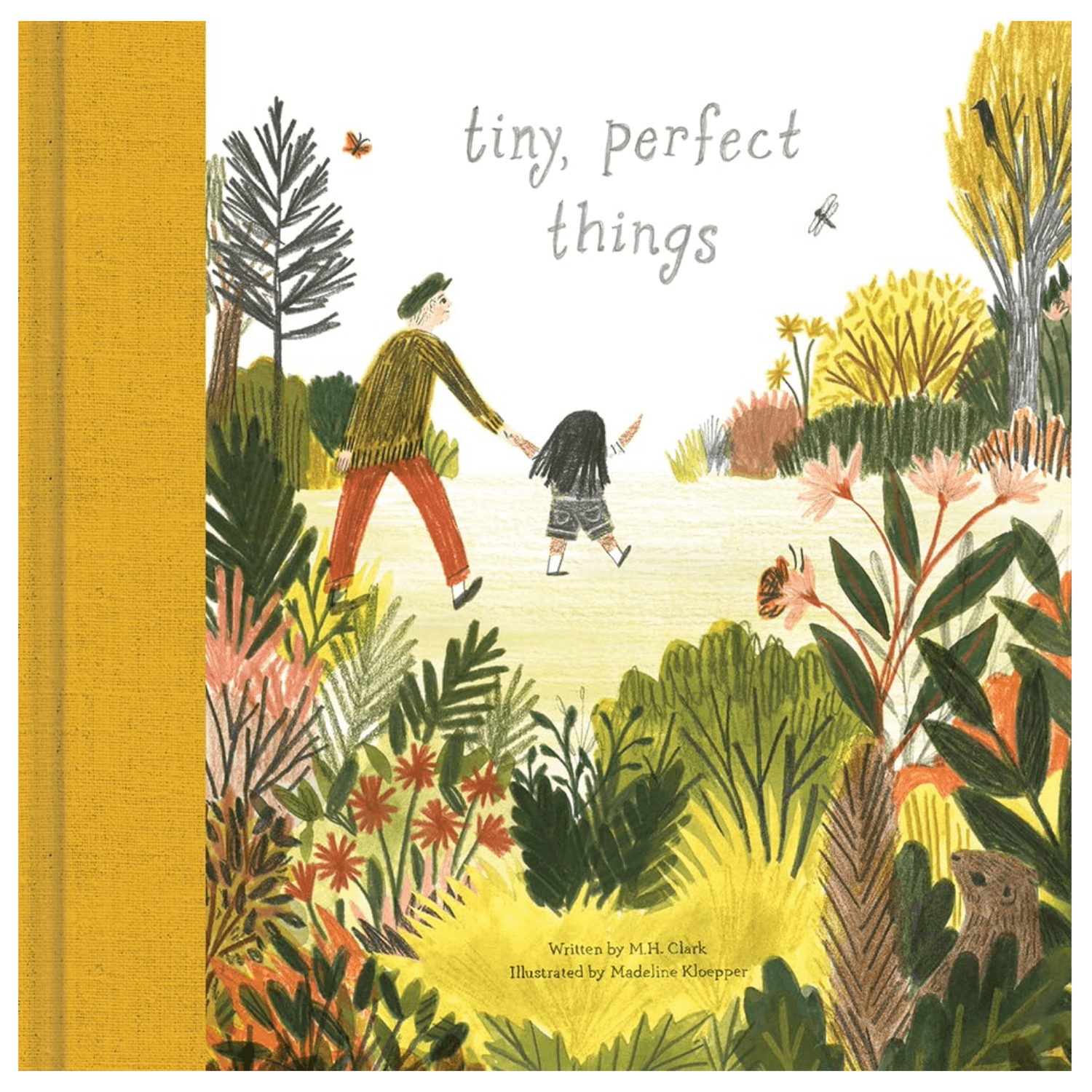 The front cover of the children's book 'tiny, perfect things' shows an illustrated scene of an adult and child holding hands while walking through a lush garden. The book has a textured mustard yellow spine on the left and a white cover with gray title text.