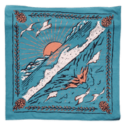 Decorative bandana with a sunset design on a blue background