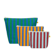 Three striped pouches in green, orange, and red in three different sizes.