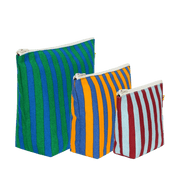 Three striped pouches in green, orange, and red in three different sizes.